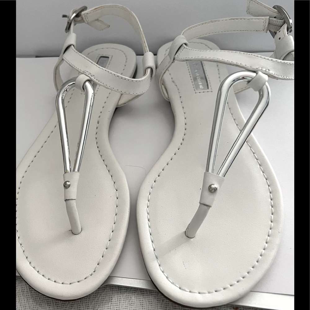 Super cute white sandals. Never worn